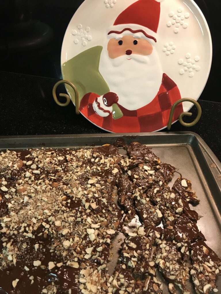 a santa plate with chocolate candy on a tray