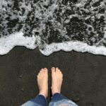 feet by the waves