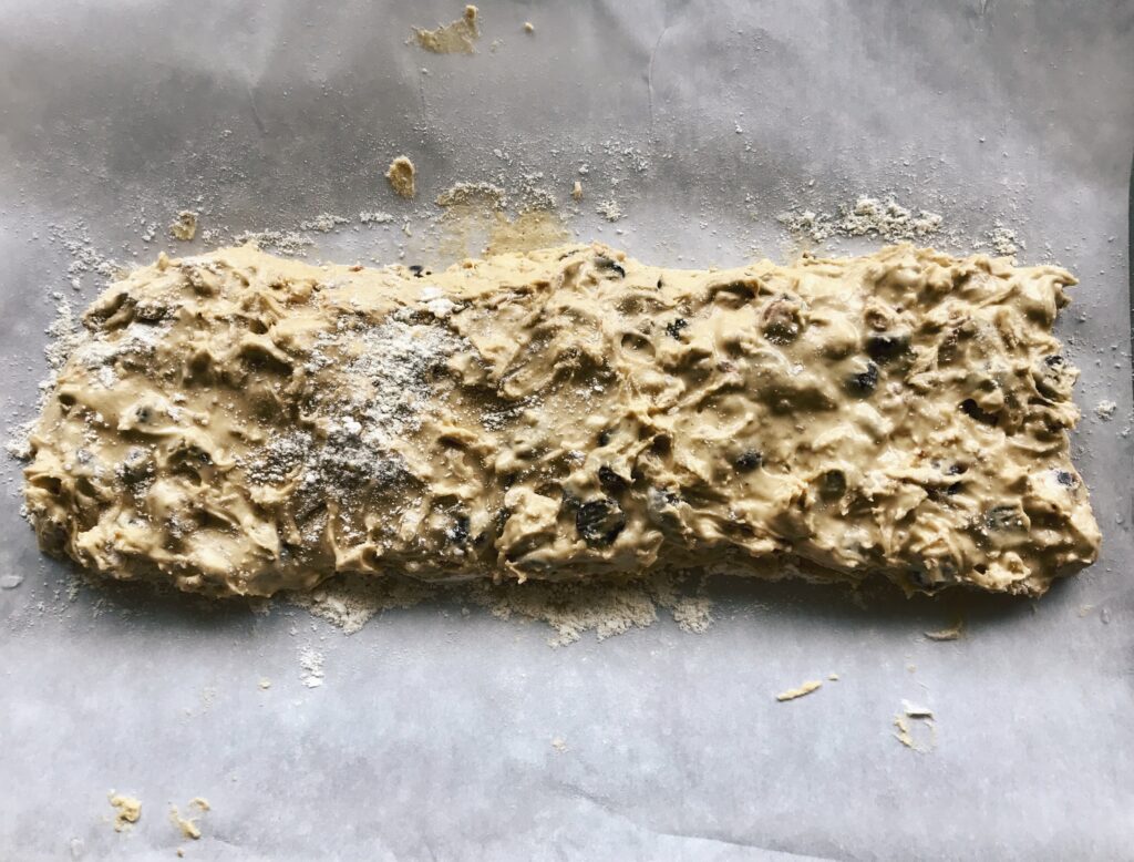 biscotti dough on a parent lined cookie sheet