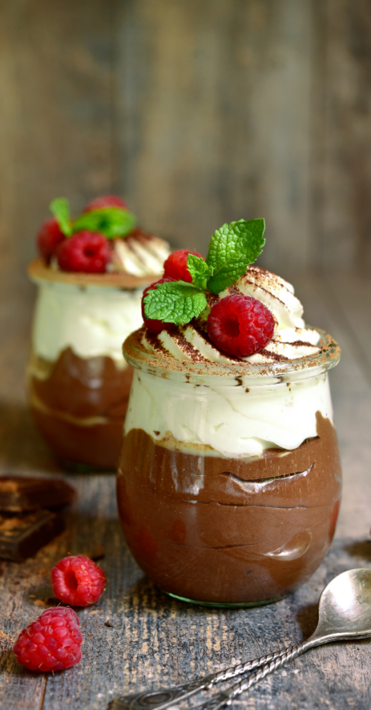 I Forgive you Chocolate Mousse with whipped cream and raspberry garnish