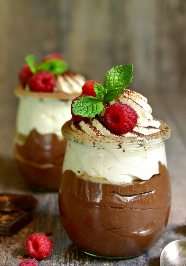 I Forgive you Chocolate Mousse with whipped cream and raspberry garnish