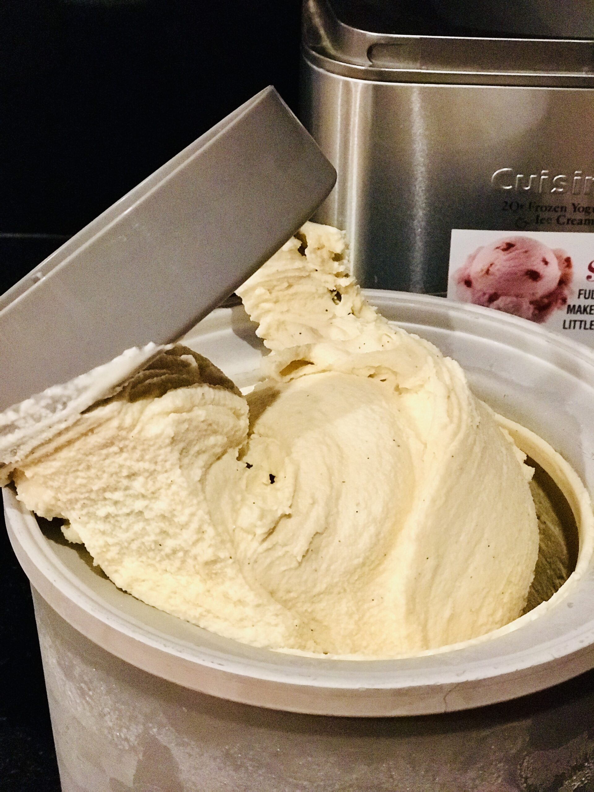 lifting the blade out of the ice cream freezer bowl