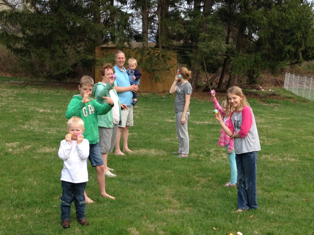 family in line for the Easter egg toss