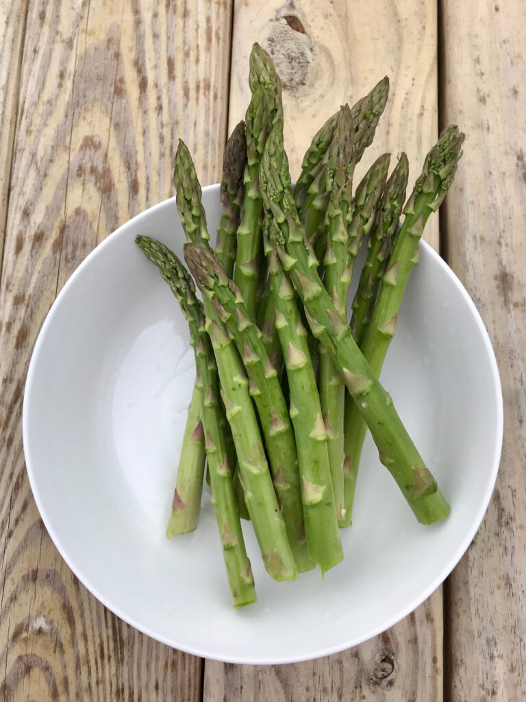 fresh asparagus in a bowl
