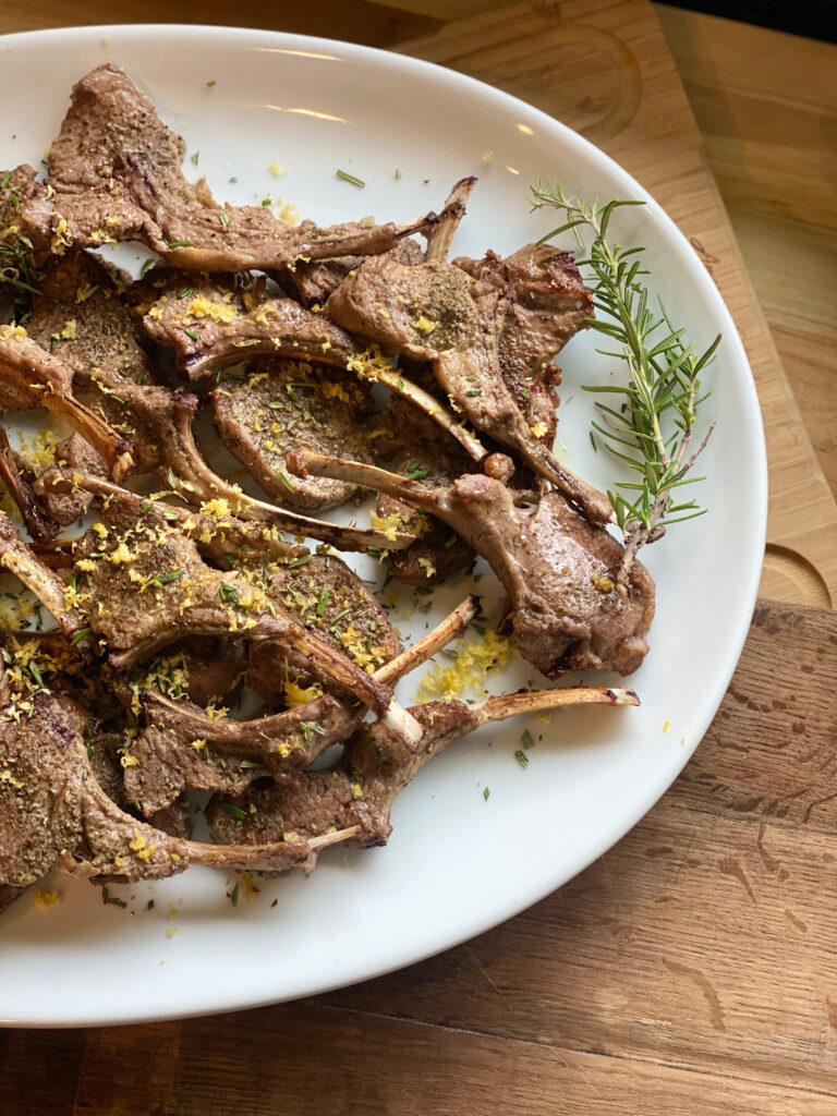 lollypop lamb chops with rosemary garnish