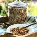 homemade granola in a beautiful glass jar with lid
