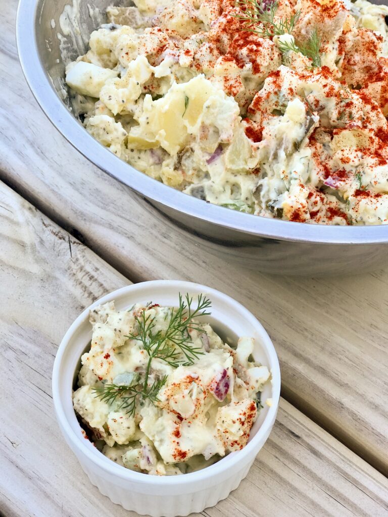 bowl and side bowl of picnic potato salad