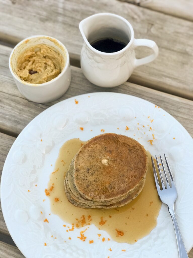 buckwheat pancakes with orange honey butter and maple syrup