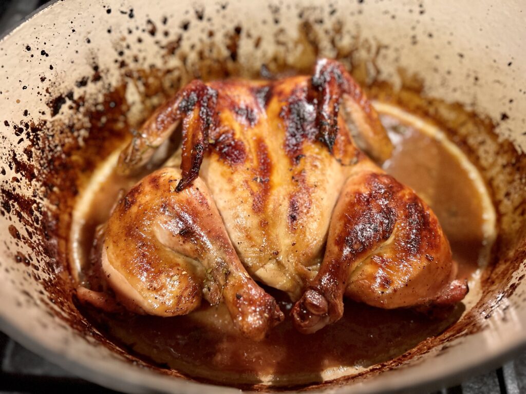 maple glazed chicken in a dutch oven