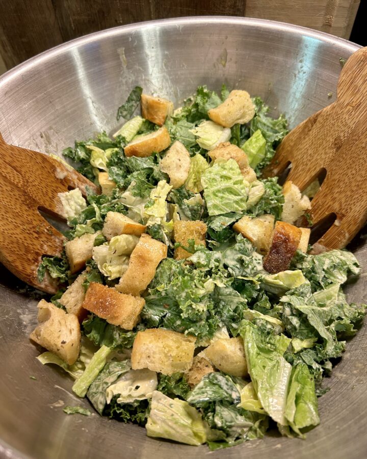 bowl of kale & Romaine Caesar salad