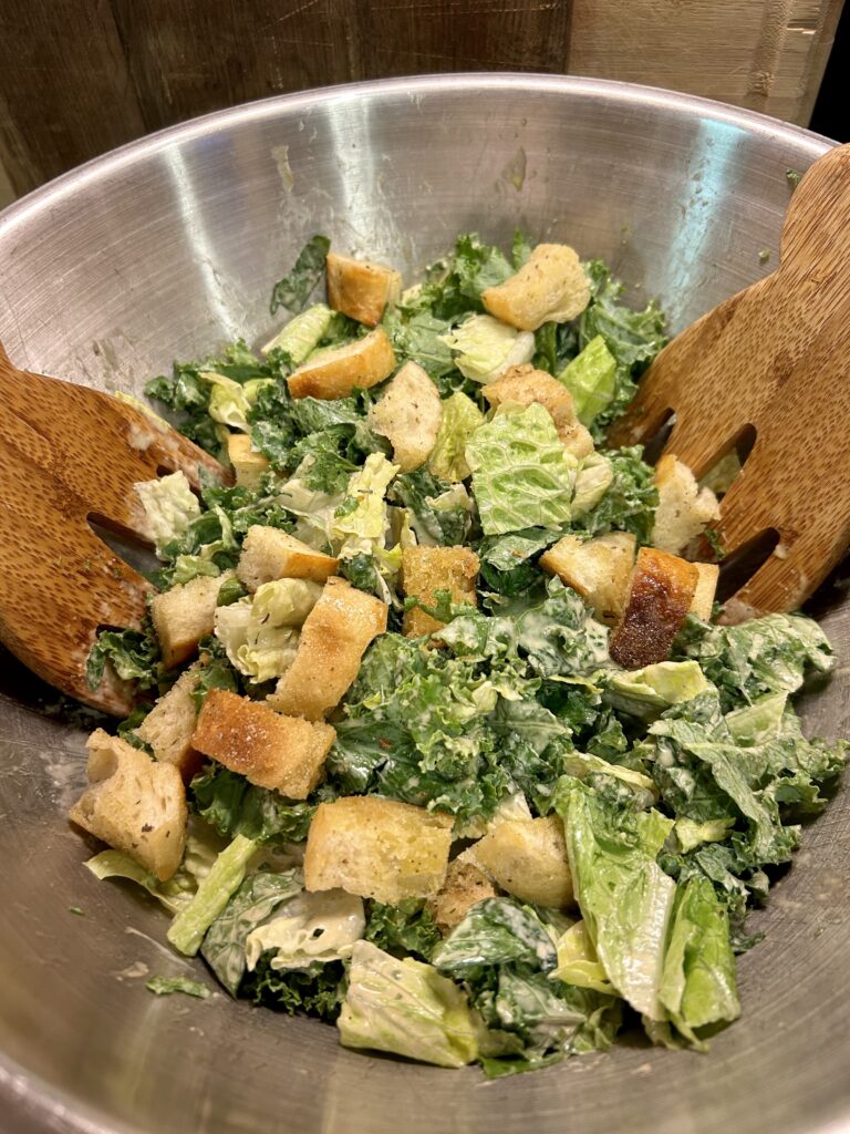 bowl of kale & Romaine Caesar salad