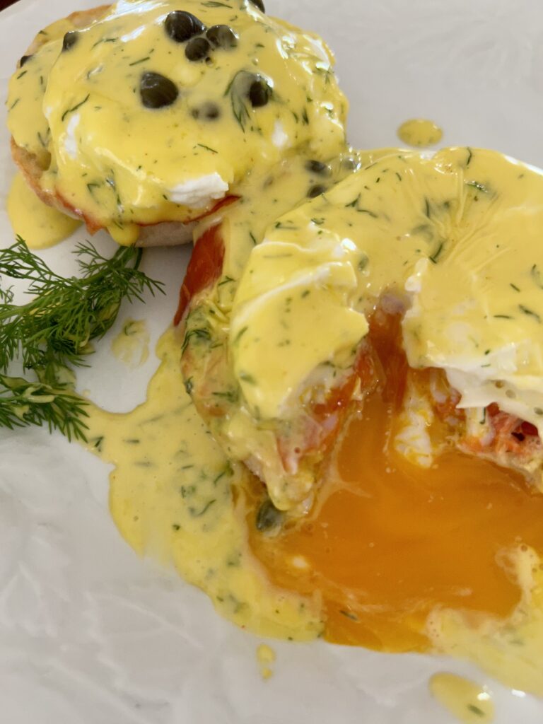 eggs Benedict with hollandaise sauce and a jammy egg