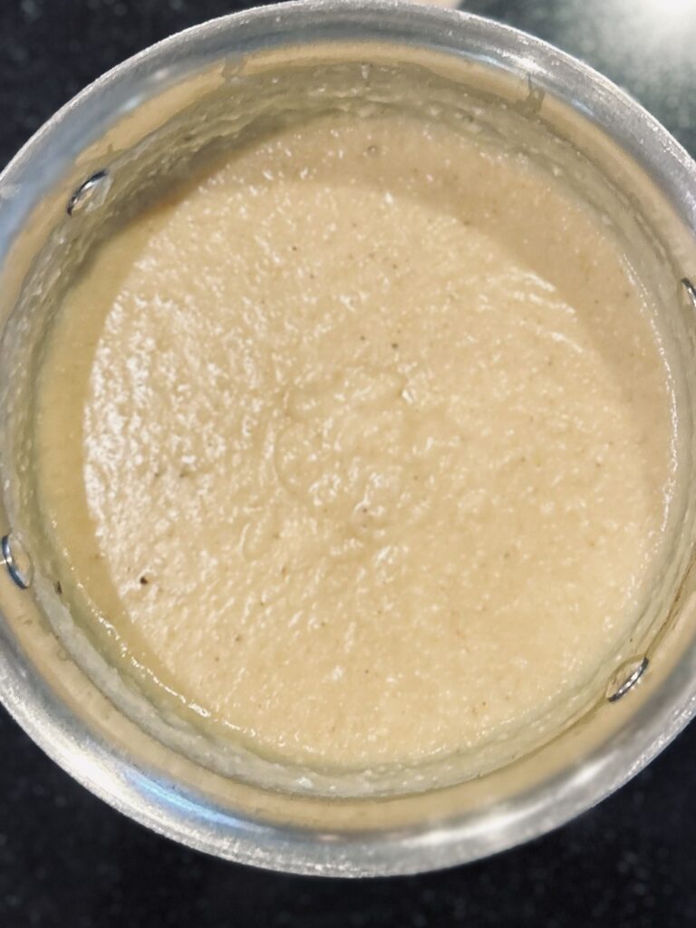 a pot of cheesy grits
