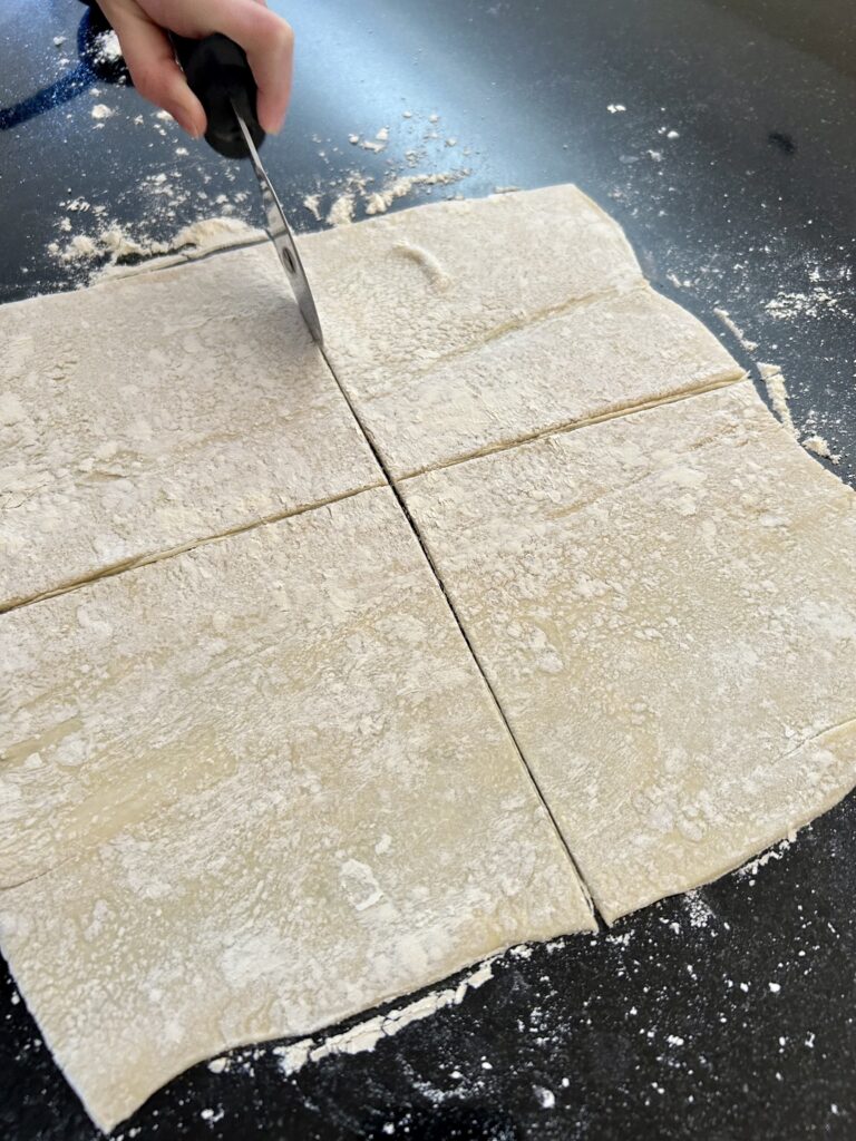 cutting puff pastry dough 