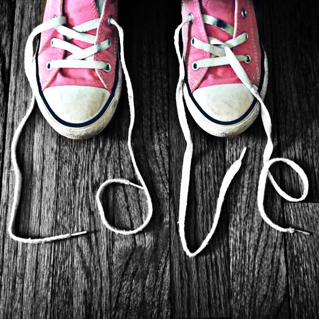 pink converse shoes with the laces spellling the word love